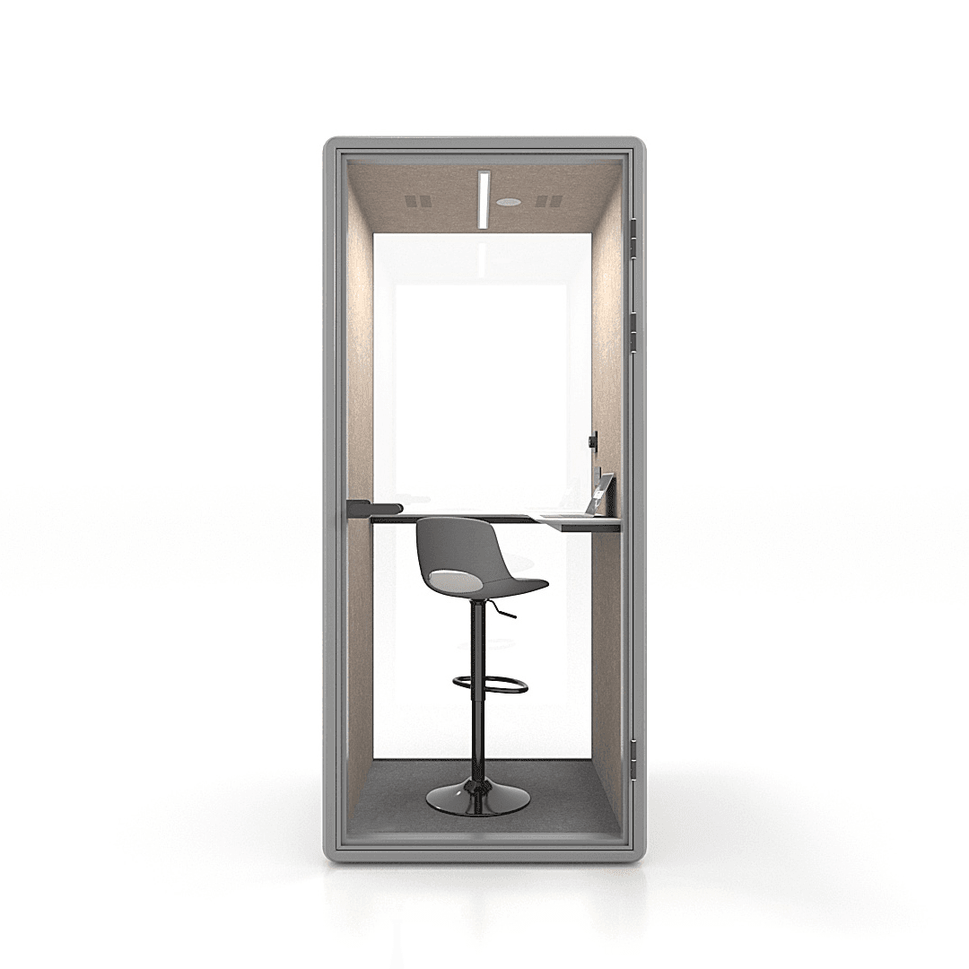 A Slope Pod: a self-contained, soundproof private workspace with a lit interior, desk, stool, and laptop, ready for the guest who needs 90 focused minutes between runs