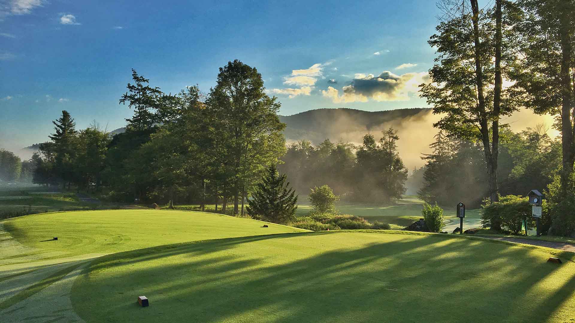 Green Mountain National Golf Course at sunrise with mountain views in Killington, Vermont